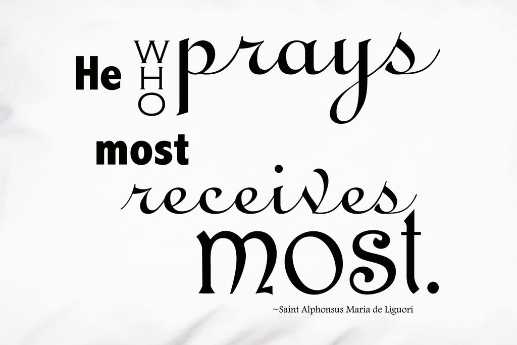 A closeup of St. Alphonsus Liguori's quote on praying.