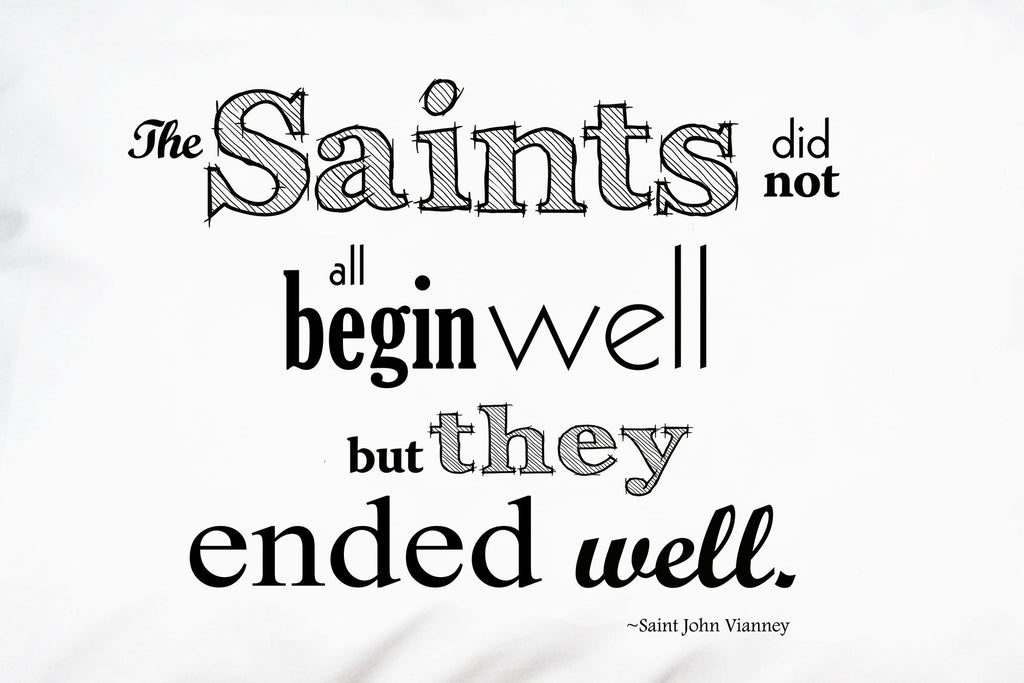 Closeup of St. John Vianney quote about saints.