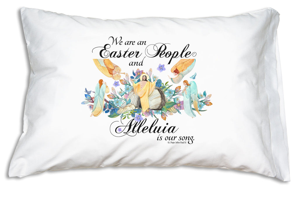 This beautiful Catholic pillowcase features Pope JPII's famous "Easter People" quote pictured with our Risen Lord attended by angels in a heavenly garden.