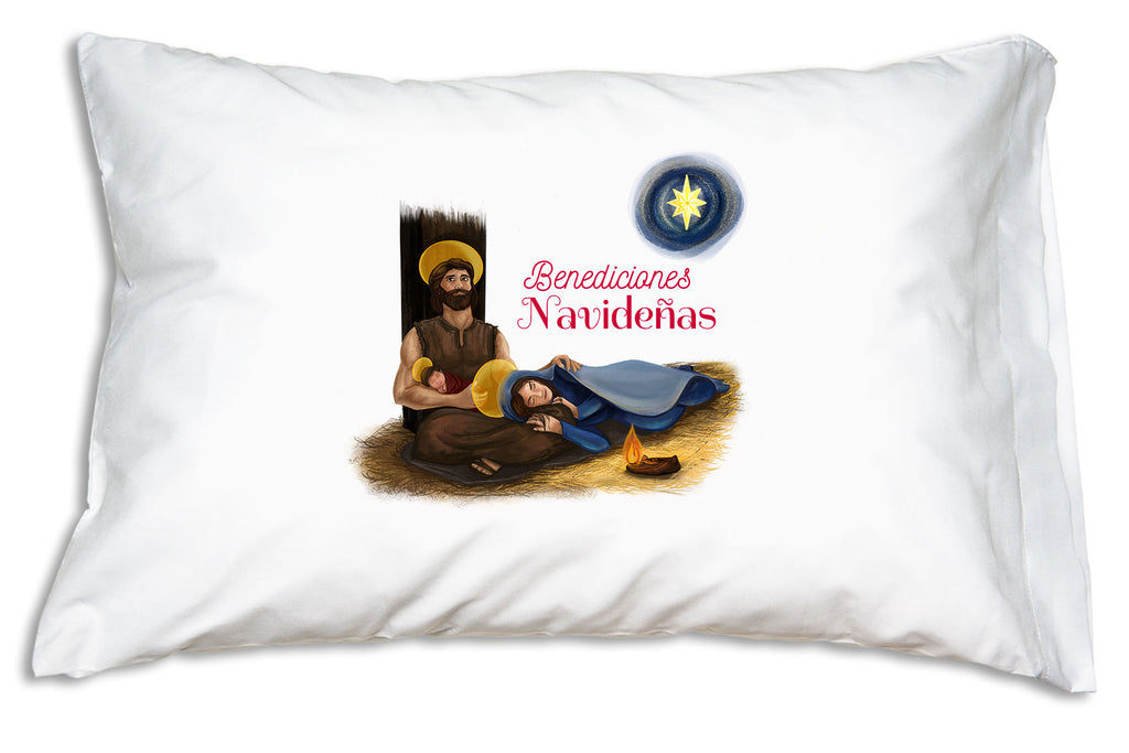 "Benediciones Navideñas" adds the finishing touch to the beautiful portrait of la Sagrada Familia on this Christmas pillowcase.