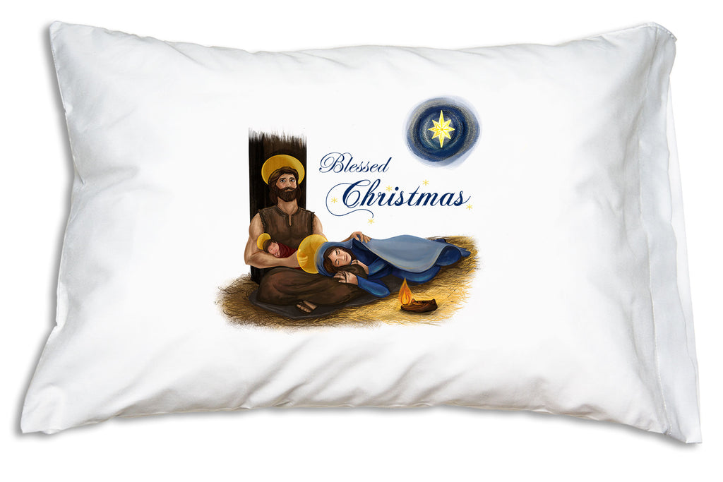 Festive script proclaiming "Blessed Christmas" complements the comforting scene for our Holy Family Blessed Christmas Prayer Pillowcase.